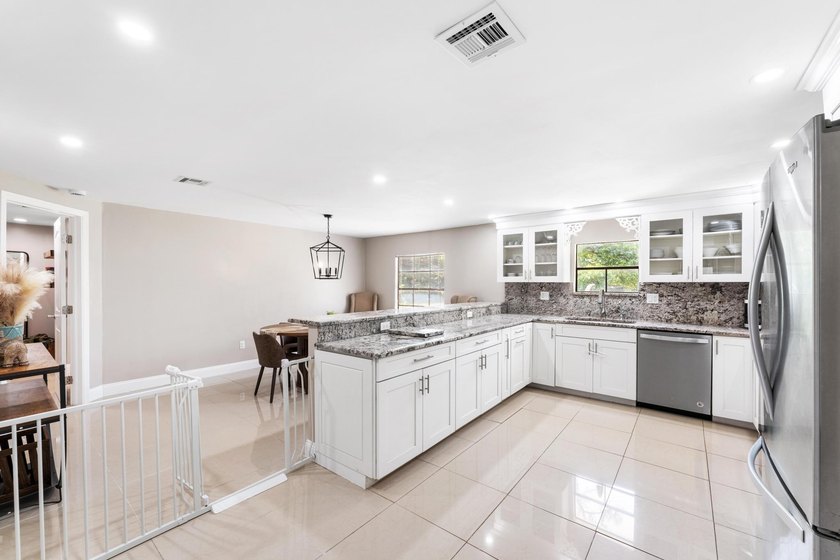This beautifully remodeled 3-bedroom, 2-bathroom home offers - photo 11