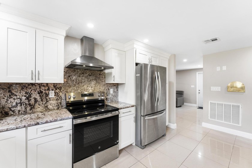 This beautifully remodeled 3-bedroom, 2-bathroom home offers - photo 14