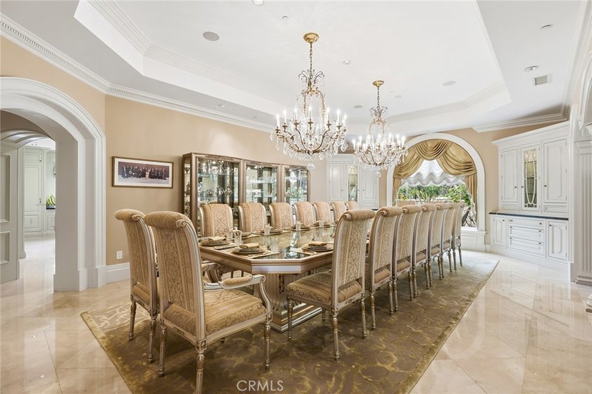 This ultra-private, gated custom estate offers a rare - photo 18