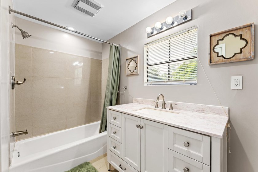 This beautifully remodeled 3-bedroom, 2-bathroom home offers - photo 22
