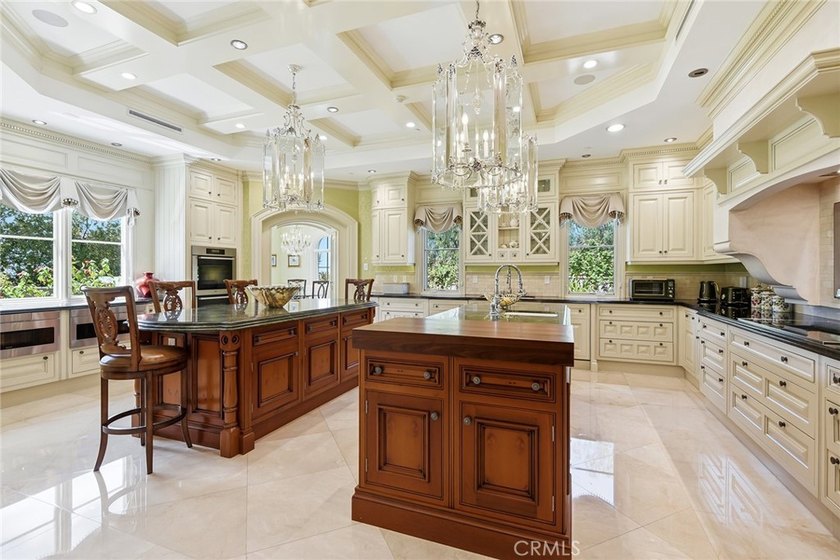 This ultra-private, gated custom estate offers a rare - photo 24