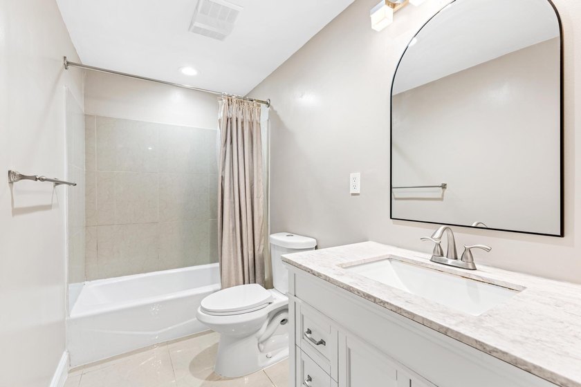 This beautifully remodeled 3-bedroom, 2-bathroom home offers - photo 24