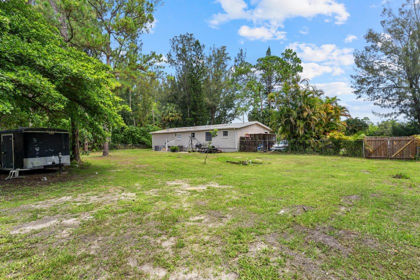 This beautifully remodeled 3-bedroom, 2-bathroom home offers - photo 29