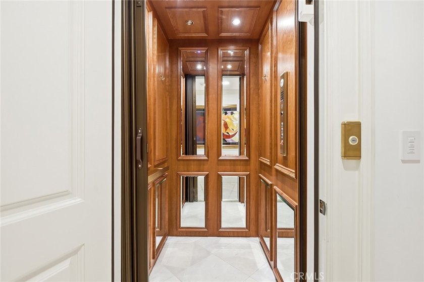 This ultra-private, gated custom estate offers a rare - photo 30