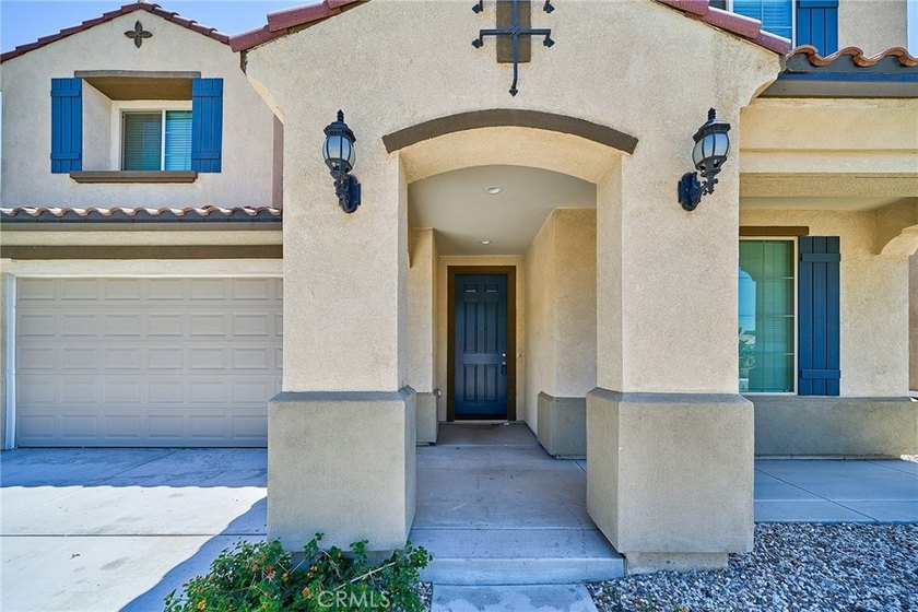 Welcome to this beautifully appointed home located in the highly - photo 2