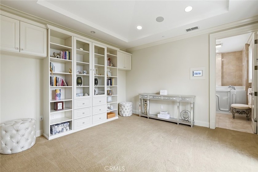 This ultra-private, gated custom estate offers a rare - photo 37