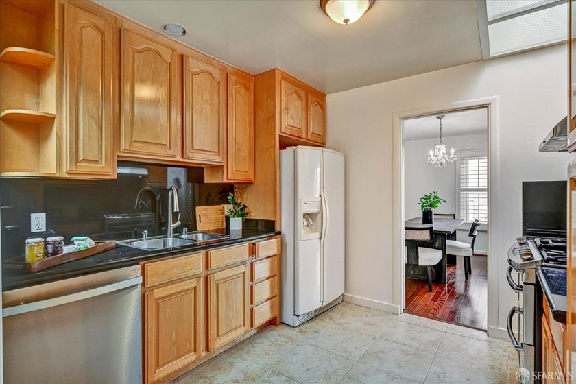 Welcome to this well-maintained 3-bedroom, 2-bath home in San - photo 4