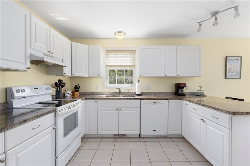 Nestled on a quiet dead-end street in Kingston, this spacious - photo 16