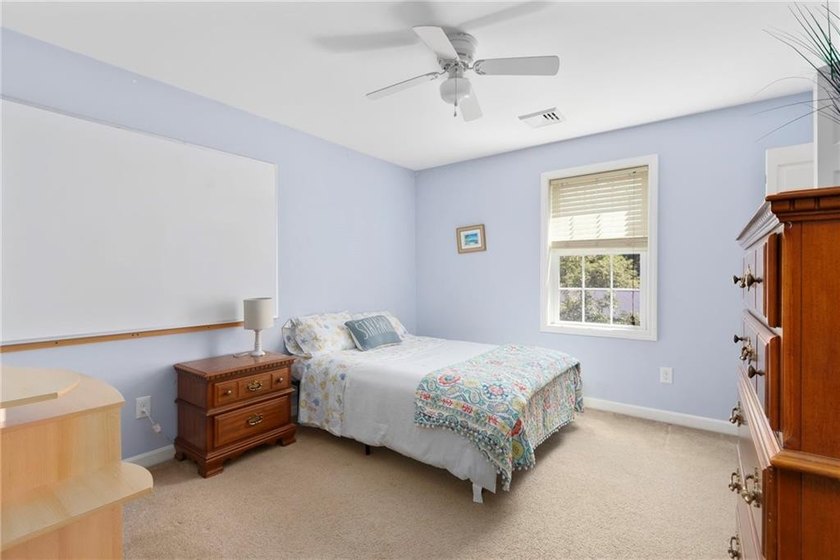Nestled on a quiet dead-end street in Kingston, this spacious - photo 21
