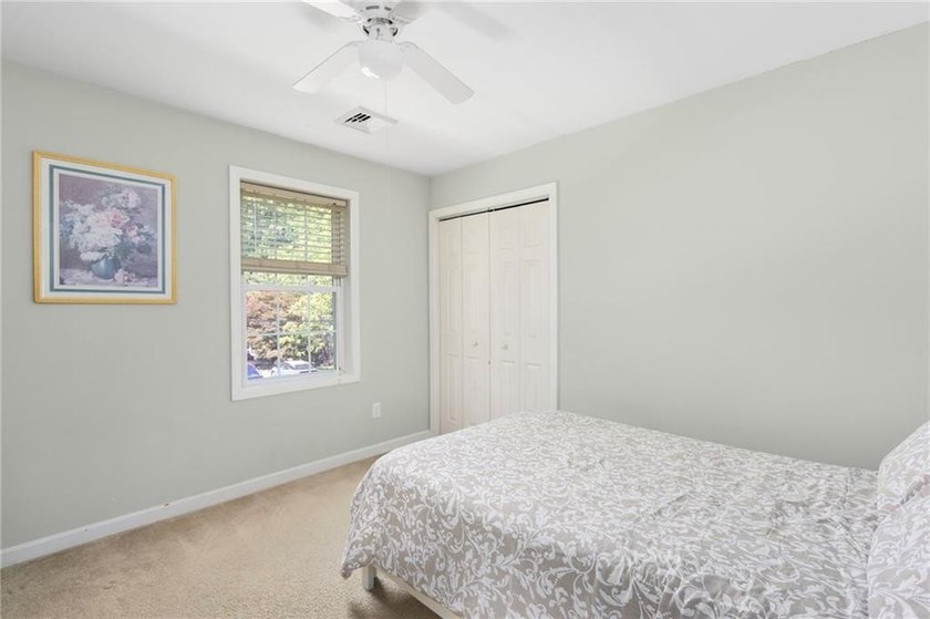 Nestled on a quiet dead-end street in Kingston, this spacious - photo 26
