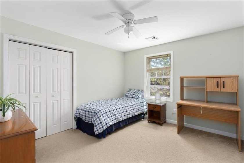 Nestled on a quiet dead-end street in Kingston, this spacious - photo 28