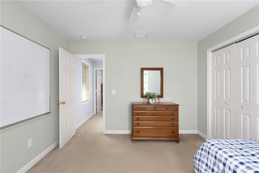 Nestled on a quiet dead-end street in Kingston, this spacious - photo 29