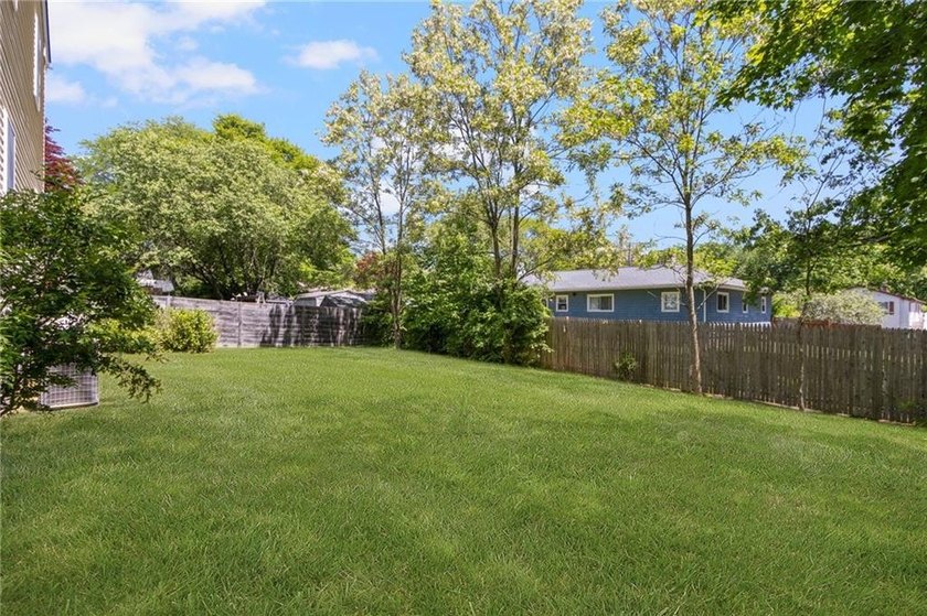 Nestled on a quiet dead-end street in Kingston, this spacious - photo 35
