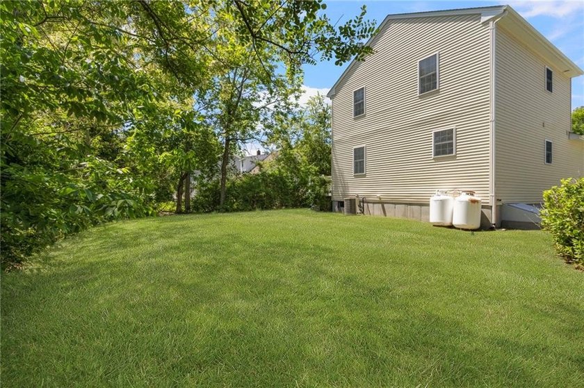Nestled on a quiet dead-end street in Kingston, this spacious - photo 39