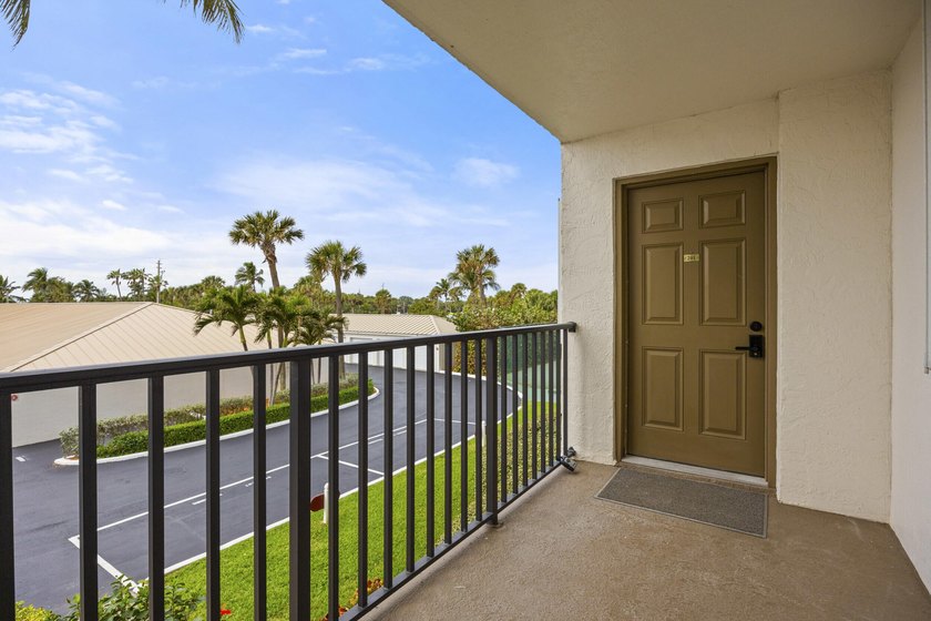 RARE 3 BEDROOM/2BATH CORNER UNIT WITH TWO GARAGES! Step inside - photo 2
