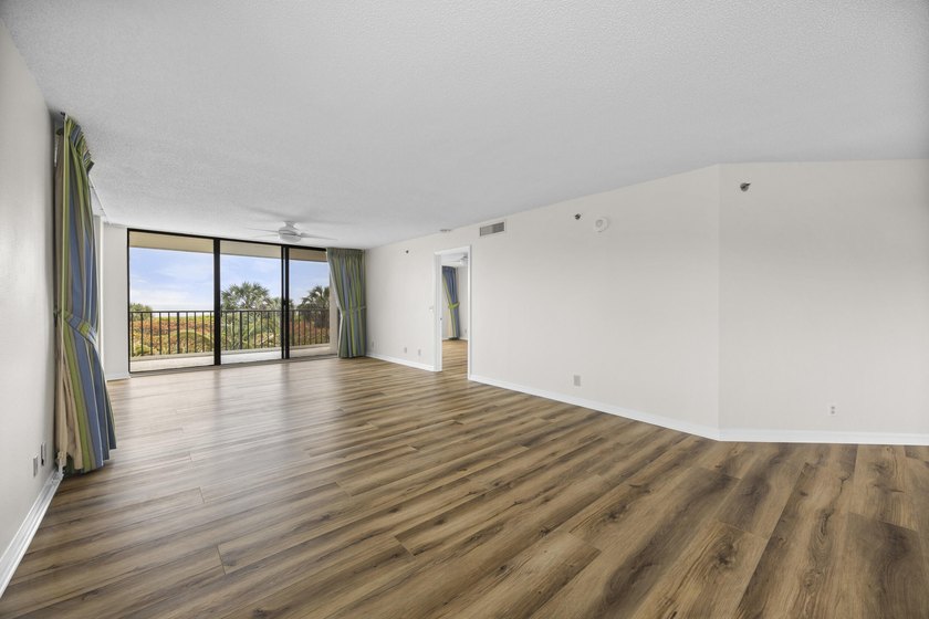 RARE 3 BEDROOM/2BATH CORNER UNIT WITH TWO GARAGES! Step inside - photo 5