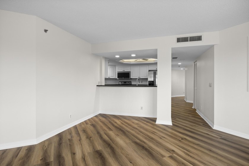 RARE 3 BEDROOM/2BATH CORNER UNIT WITH TWO GARAGES! Step inside - photo 8