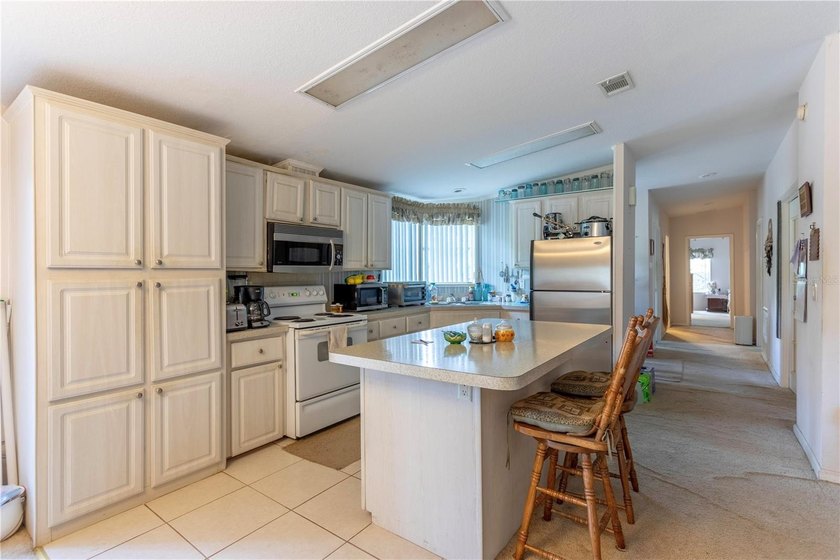 3/2 Mobile home on 5 acres. Land is a combination of wooded and - photo 2