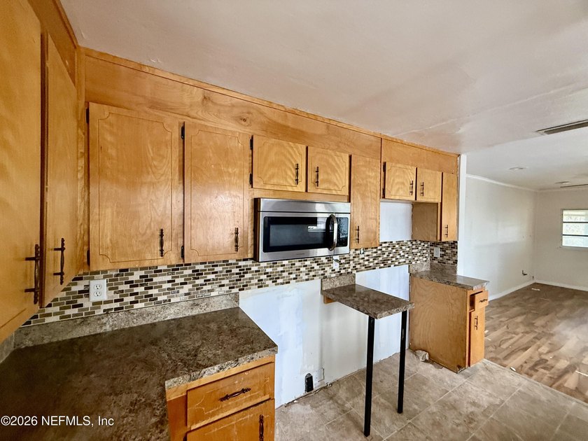 Unlock the potential in this 2 bedroom, 2 bath with a flex room - photo 8