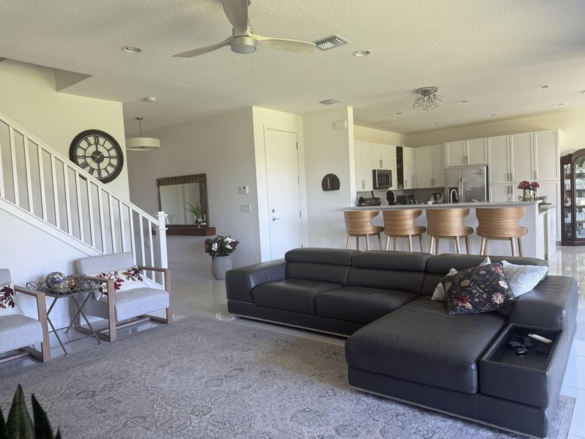 Welcome to this exceptional two-story residence, nestled within - photo 7