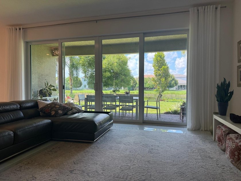 Welcome to this exceptional two-story residence, nestled within - photo 8