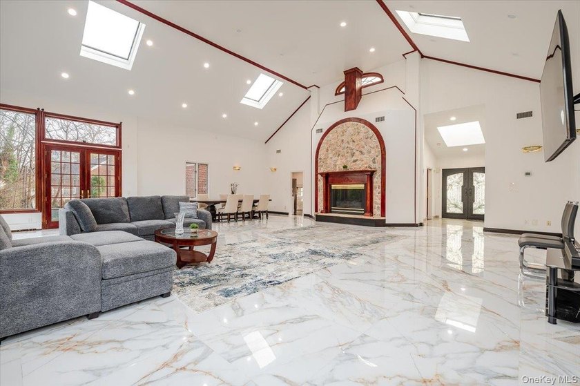 Welcome to this Sprawling Ranch in the Prestigious Village of - photo 4