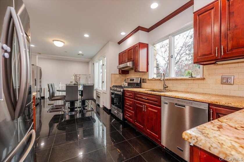 Welcome to this Sprawling Ranch in the Prestigious Village of - photo 9