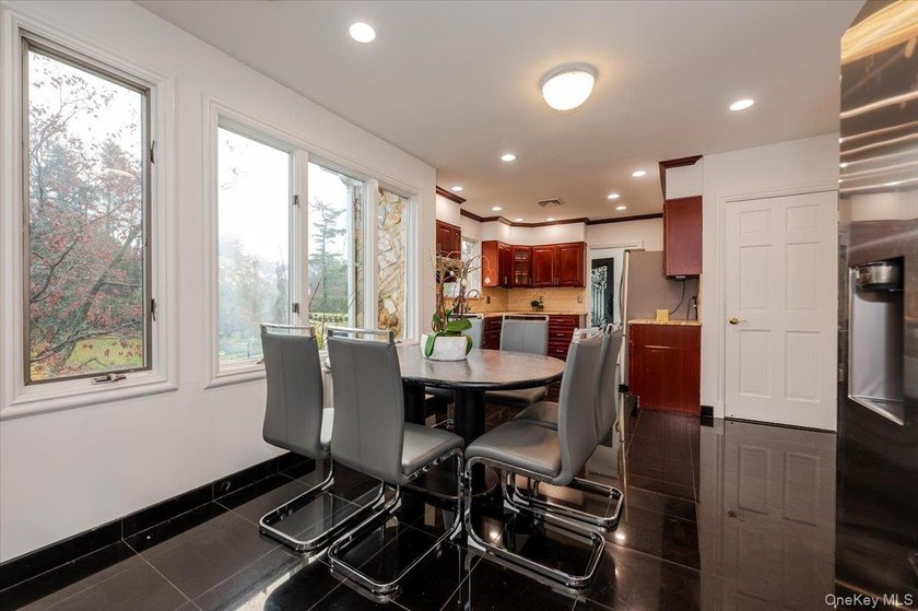 Welcome to this Sprawling Ranch in the Prestigious Village of - photo 10