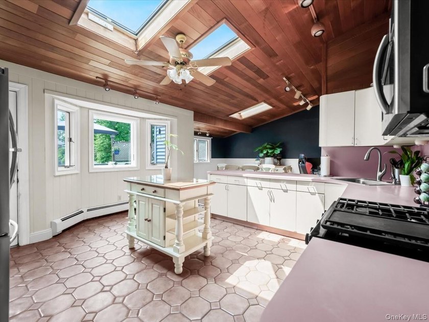 Welcome to 66 Moffitt Boulevard, a spacious three-bedroom - photo 11