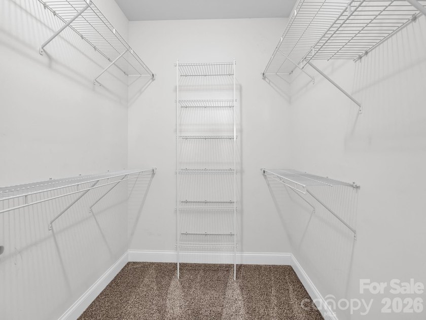 Welcome home to this beautifully maintained stucco and stone - photo 24