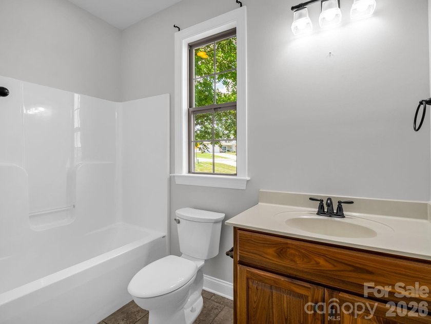 Welcome home to this beautifully maintained stucco and stone - photo 29