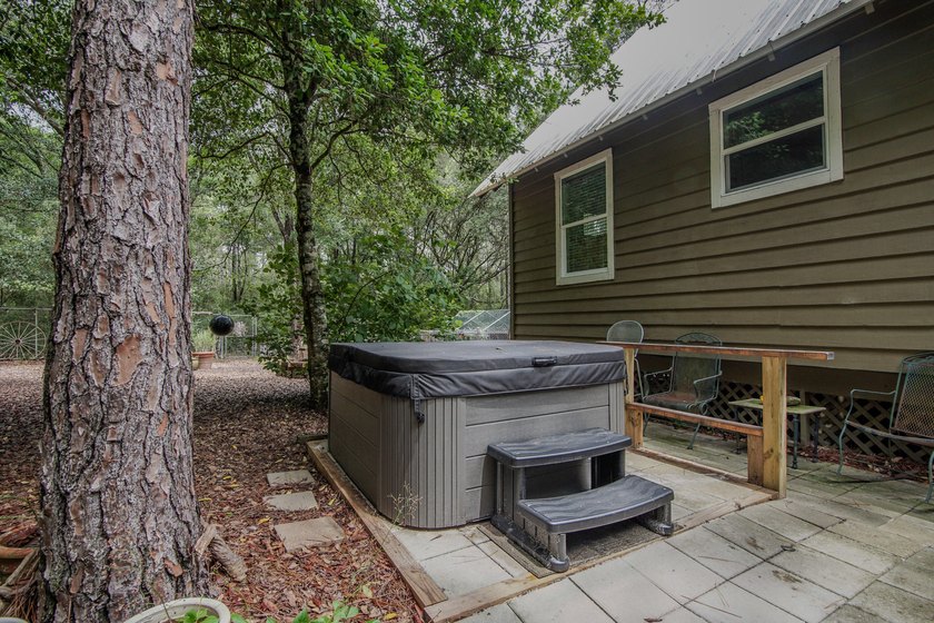 Florida cottage on .79 acres - totally renovated and nestled in - photo 32