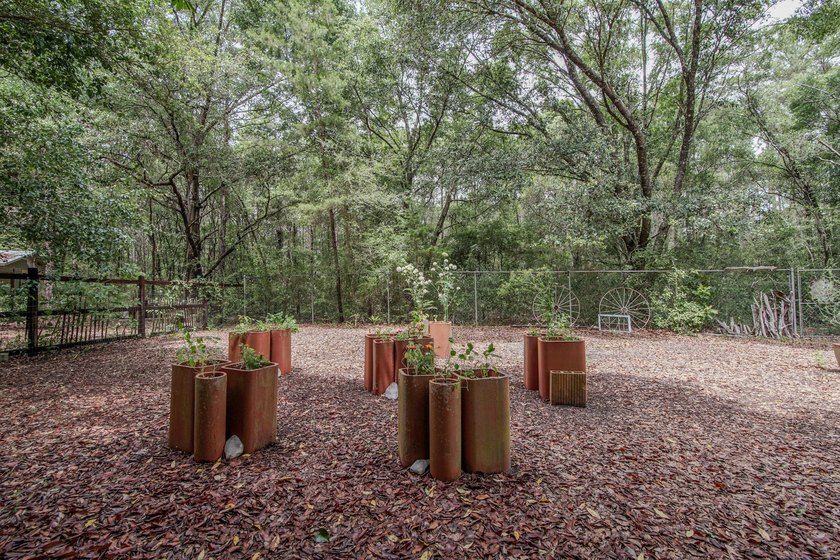 Florida cottage on .79 acres - totally renovated and nestled in - photo 36