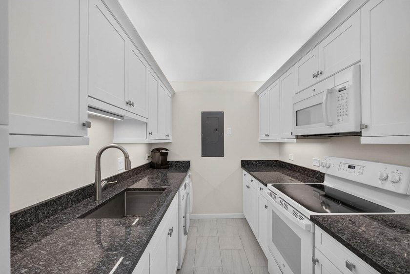 The largest and most coveted condo floorplan in Old Port Cove! - photo 4
