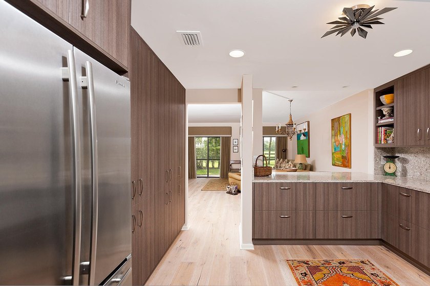Welcome to this charming two-bedroom, two-bathroom condominium - photo 8