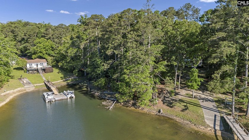 7.44 acres connected to Dominion Energy lakefront land. Recently - photo 15