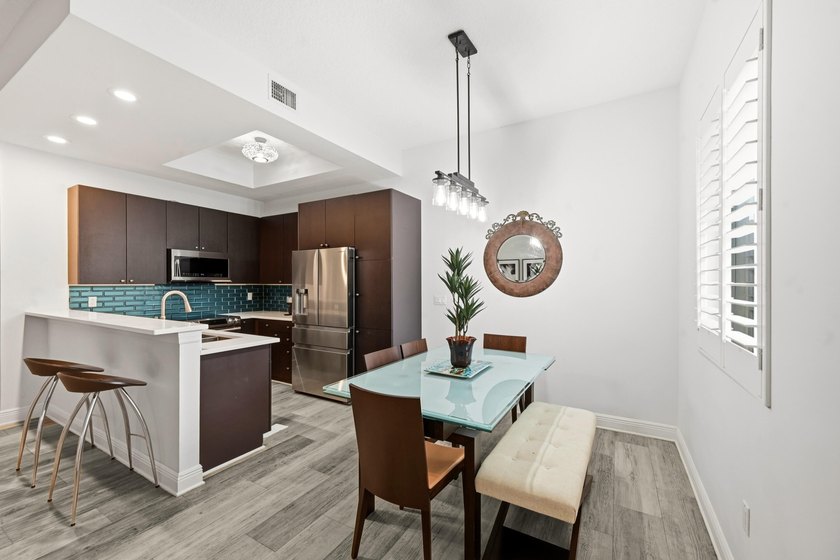 Nestled in the vibrant heart of Lake Worth Beach, this spacious - photo 2