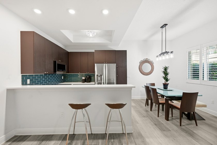 Nestled in the vibrant heart of Lake Worth Beach, this spacious - photo 4
