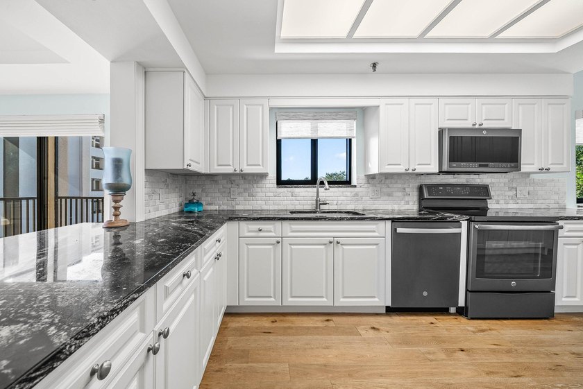 Waterfront condo for sale in the sought-after 12 Oaks community - photo 25