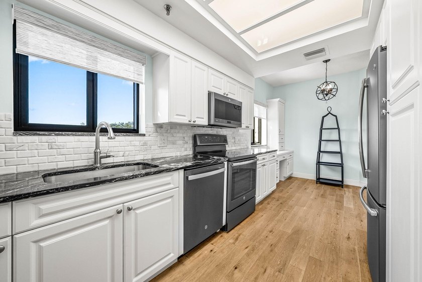 Waterfront condo for sale in the sought-after 12 Oaks community - photo 27