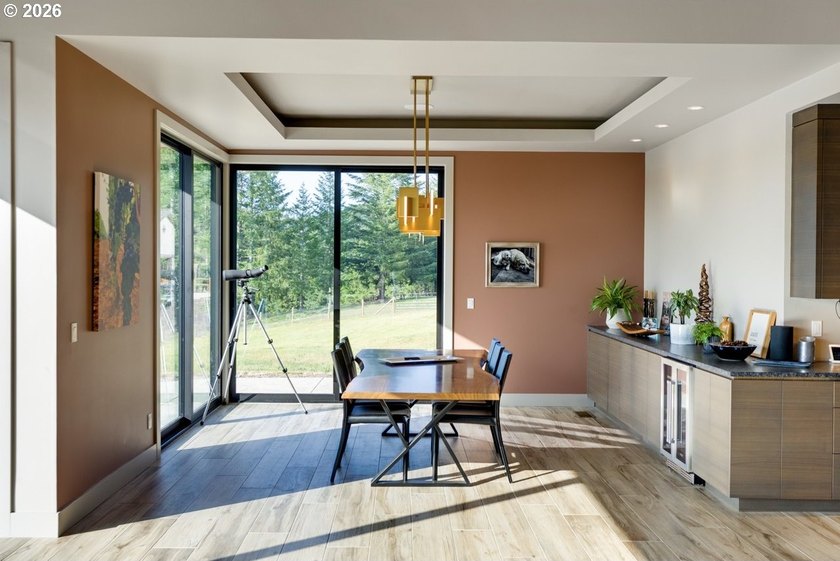 Spectacular modern masterpiece on 124.5 acres. This 2023-built - photo 13