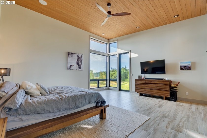 Spectacular modern masterpiece on 124.5 acres. This 2023-built - photo 21