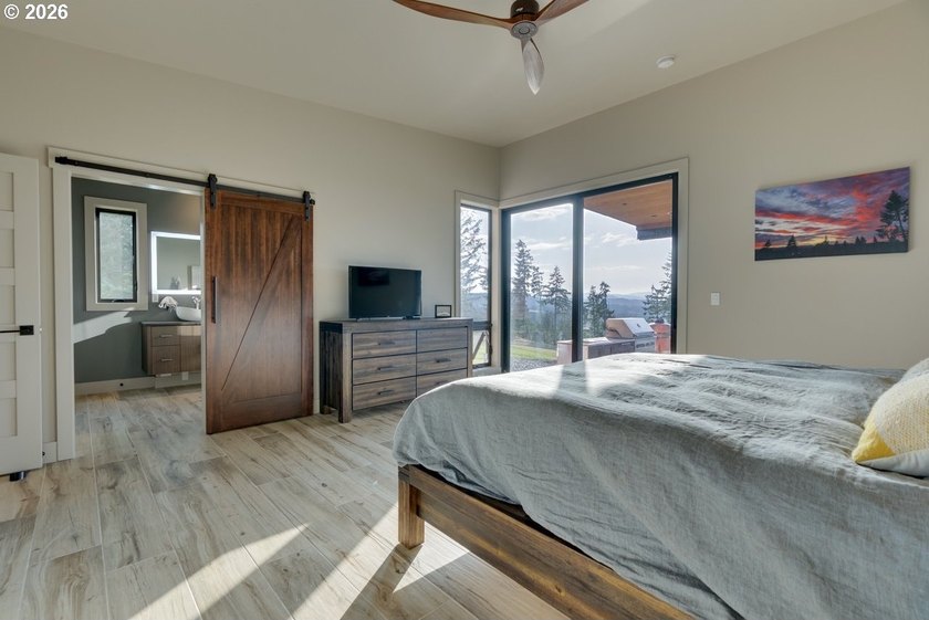 Spectacular modern masterpiece on 124.5 acres. This 2023-built - photo 27