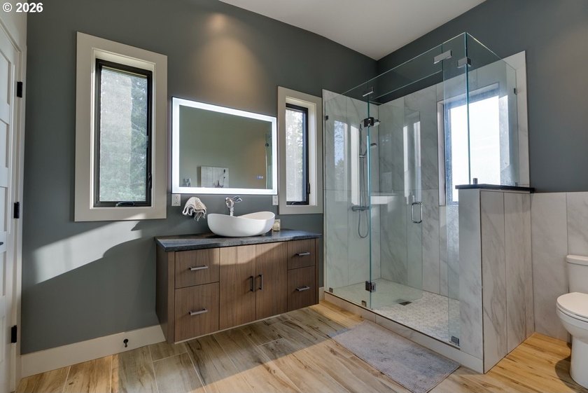 Spectacular modern masterpiece on 124.5 acres. This 2023-built - photo 28