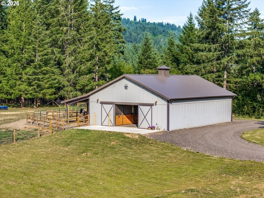 Spectacular modern masterpiece on 124.5 acres. This 2023-built - photo 39