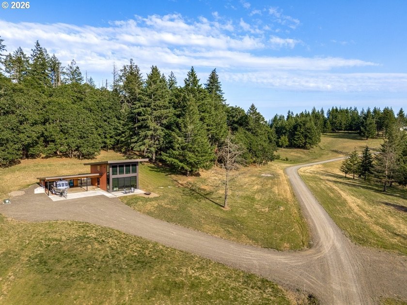 Spectacular modern masterpiece on 124.5 acres. This 2023-built - photo 41