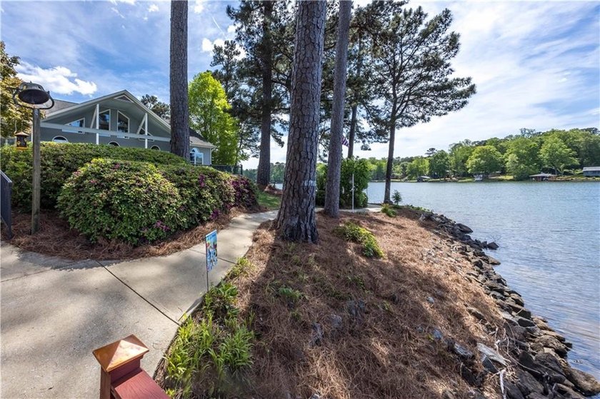 Experience elevated lakefront living on one of the most - photo 54