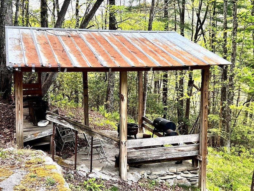 Tucked into a peaceful setting, this home invites you to slow - photo 10