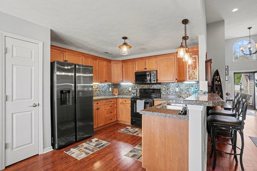 This beautifully maintained home in Highland Woods showcases - photo 11