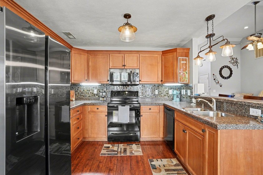 This beautifully maintained home in Highland Woods showcases - photo 13
